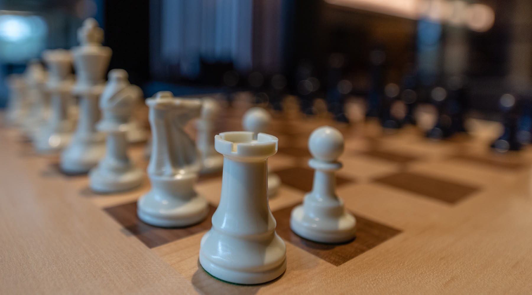 The Art of Living a chess board with pieces