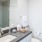 a bathroom with a large mirror